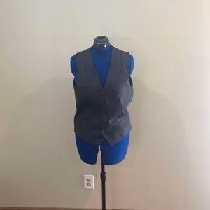 A black men’s vest with a blue interior